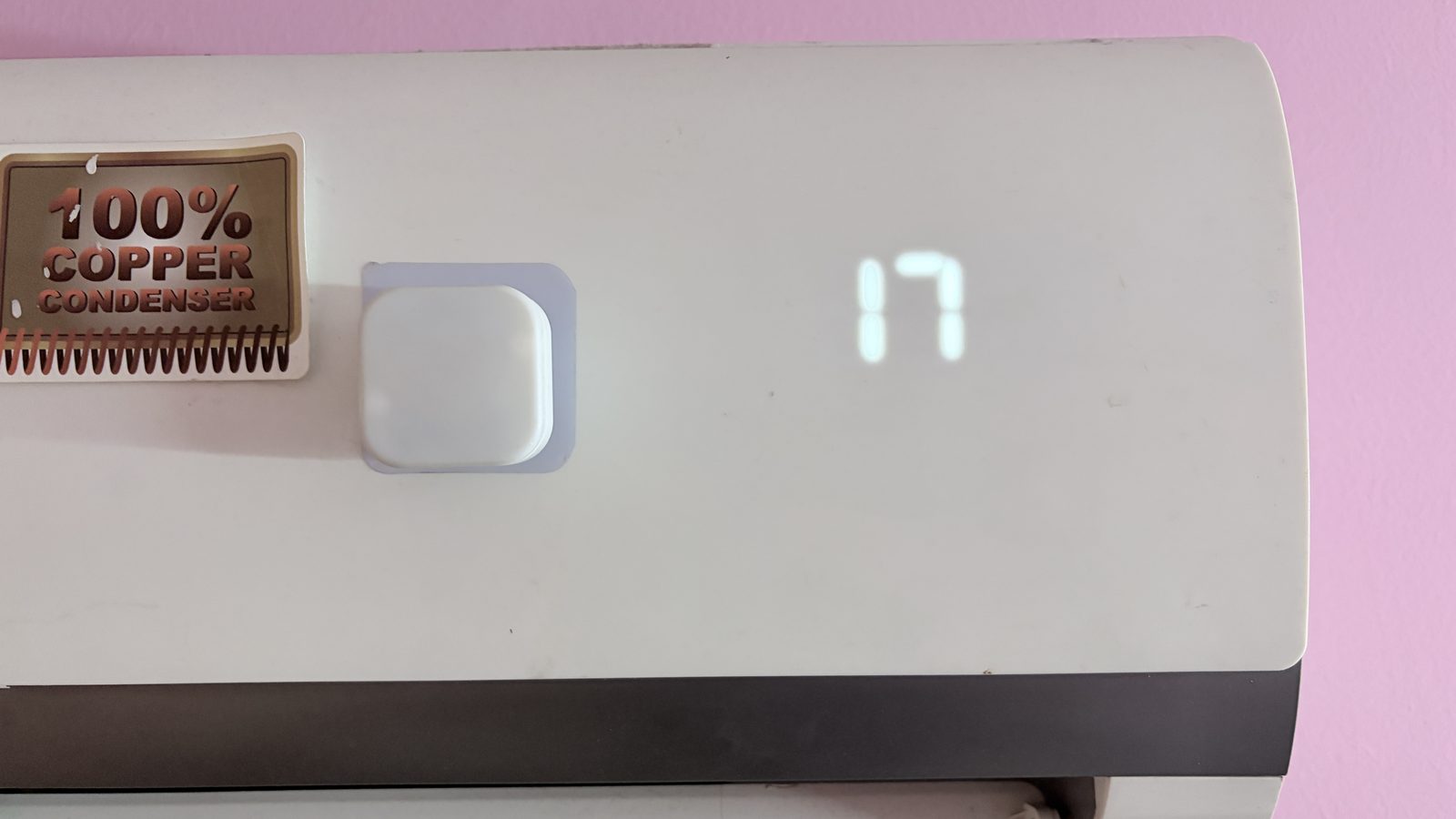 Close-up of the Dot mounted on the AC unit.